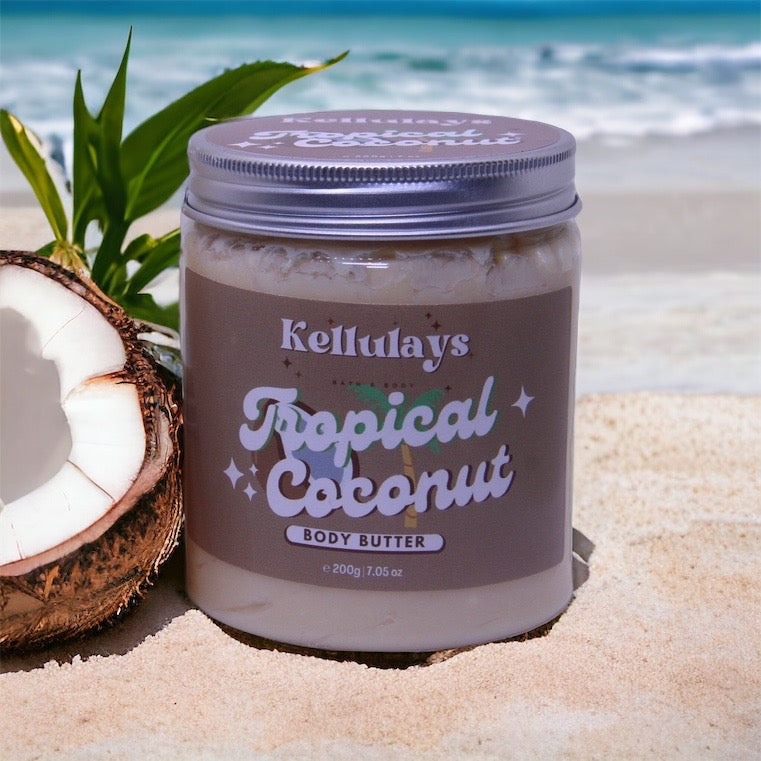 Light beige swirl of Kellulays Tropical Coconut Whipped Body Butter, showcasing its luxurious texture. This handmade body butter combines nourishing shea butter lotion and cocoa butter lotion for a deeply hydrating and soothing skincare experience.